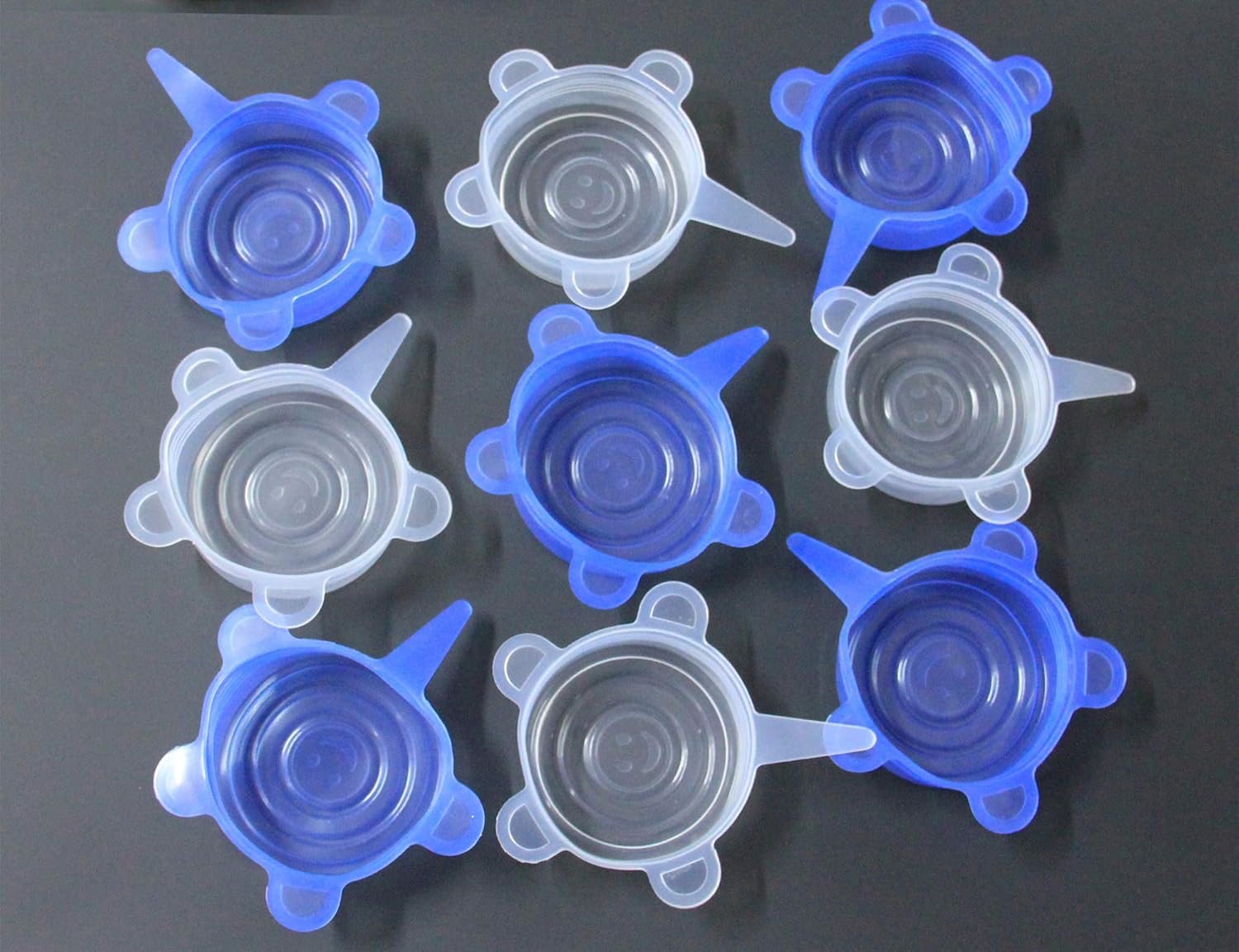 Comtim silicone lids covering various pet food cans